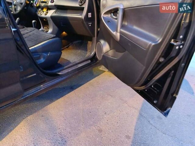 Черный Тойота РАВ 4, объемом двигателя 2 л и пробегом 165 тыс. км за 9500 $, фото 22 на Automoto.ua