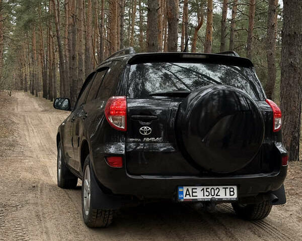Чорний Тойота РАВ 4, об'ємом двигуна 2 л та пробігом 189 тис. км за 9500 $, фото 10 на Automoto.ua