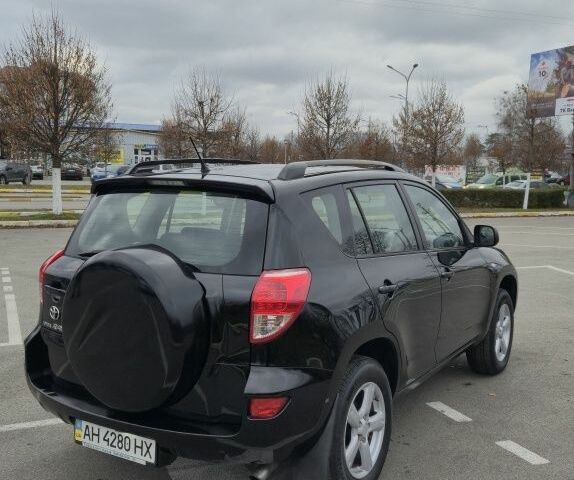 Черный Тойота РАВ 4, объемом двигателя 2 л и пробегом 173 тыс. км за 8999 $, фото 4 на Automoto.ua