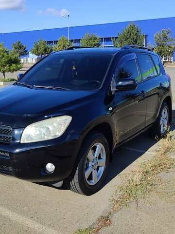 Черный Тойота РАВ 4, объемом двигателя 2 л и пробегом 165 тыс. км за 9500 $, фото 6 на Automoto.ua