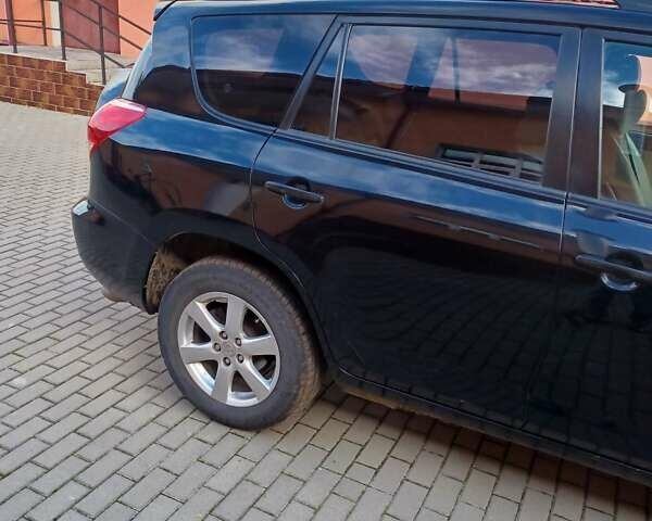 Черный Тойота РАВ 4, объемом двигателя 2.36 л и пробегом 200 тыс. км за 9000 $, фото 2 на Automoto.ua