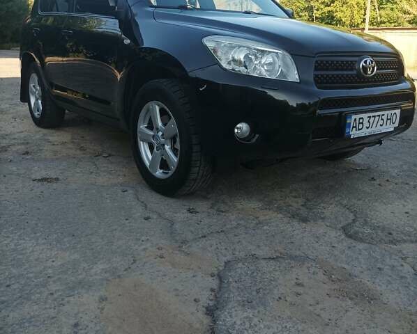 Чорний Тойота РАВ 4, об'ємом двигуна 2 л та пробігом 240 тис. км за 10300 $, фото 1 на Automoto.ua