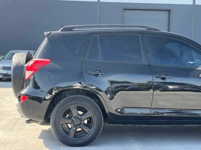 Чорний Тойота РАВ 4, об'ємом двигуна 2 л та пробігом 300 тис. км за 6490 $, фото 4 на Automoto.ua