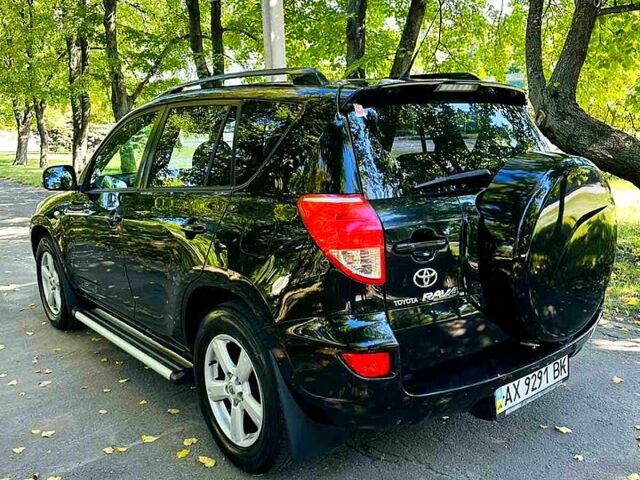 Черный Тойота РАВ 4, объемом двигателя 2 л и пробегом 257 тыс. км за 7999 $, фото 2 на Automoto.ua