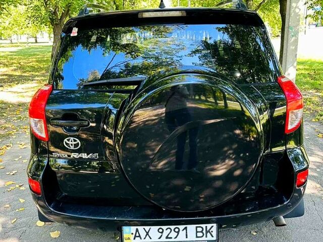 Черный Тойота РАВ 4, объемом двигателя 2 л и пробегом 257 тыс. км за 7999 $, фото 4 на Automoto.ua