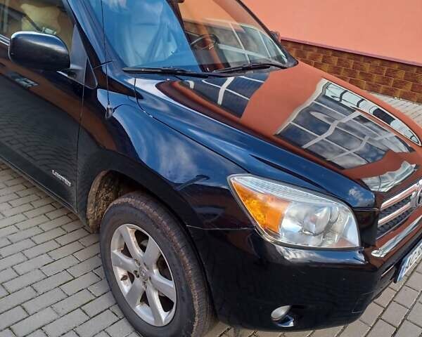 Черный Тойота РАВ 4, объемом двигателя 2.36 л и пробегом 200 тыс. км за 9000 $, фото 5 на Automoto.ua