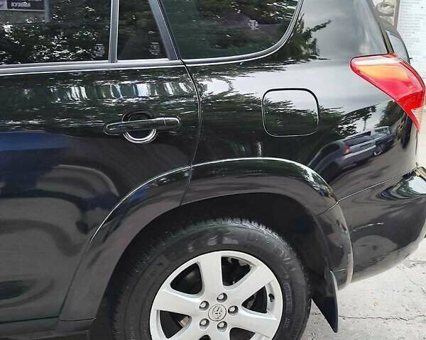 Чорний Тойота РАВ 4, об'ємом двигуна 2.4 л та пробігом 91 тис. км за 12500 $, фото 16 на Automoto.ua