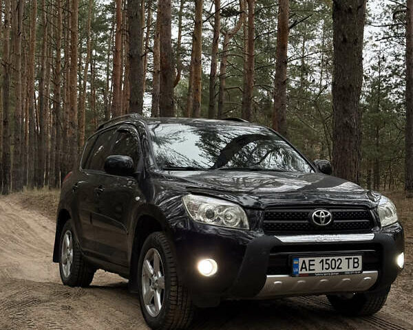 Чорний Тойота РАВ 4, об'ємом двигуна 2 л та пробігом 189 тис. км за 9500 $, фото 6 на Automoto.ua