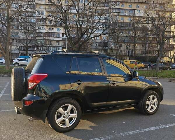 Черный Тойота РАВ 4, объемом двигателя 1.99 л и пробегом 313 тыс. км за 12000 $, фото 3 на Automoto.ua