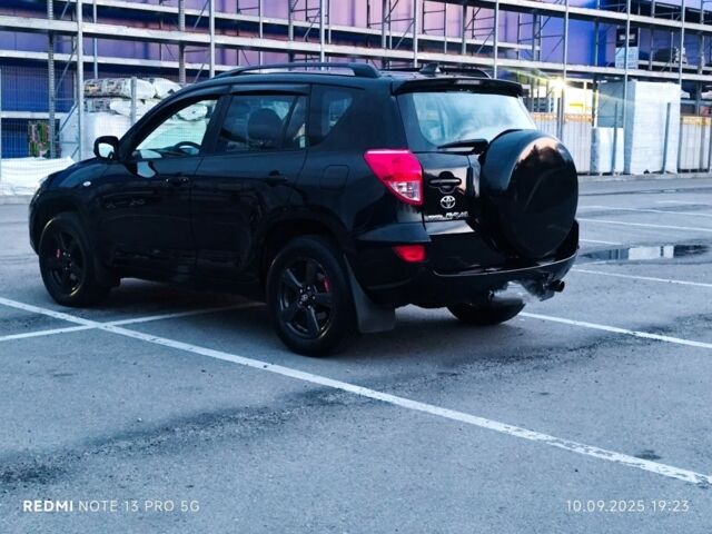 Черный Тойота РАВ 4, объемом двигателя 2 л и пробегом 149 тыс. км за 9490 $, фото 1 на Automoto.ua