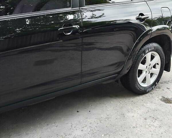 Чорний Тойота РАВ 4, об'ємом двигуна 2.4 л та пробігом 91 тис. км за 12500 $, фото 15 на Automoto.ua