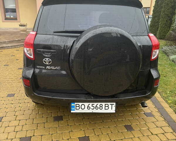 Черный Тойота РАВ 4, объемом двигателя 2 л и пробегом 230 тыс. км за 8500 $, фото 4 на Automoto.ua