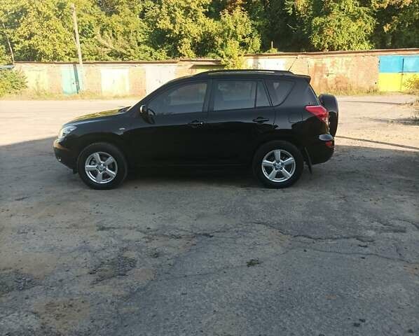 Чорний Тойота РАВ 4, об'ємом двигуна 2 л та пробігом 240 тис. км за 10300 $, фото 6 на Automoto.ua