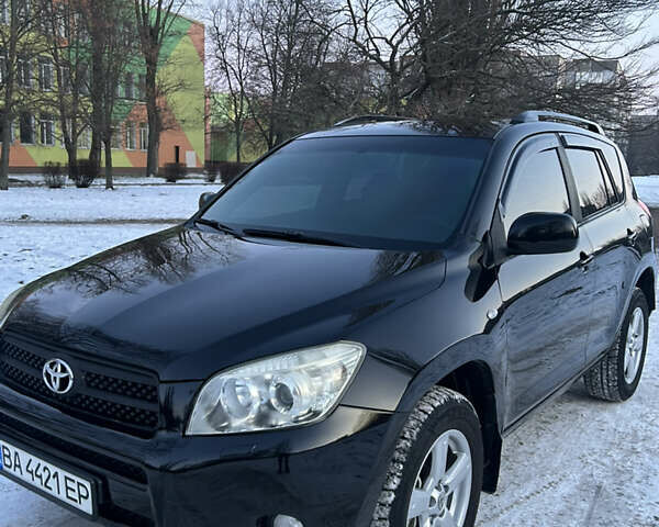 Черный Тойота РАВ 4, объемом двигателя 2 л и пробегом 220 тыс. км за 8200 $, фото 1 на Automoto.ua