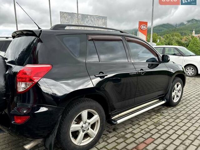 Черный Тойота РАВ 4, объемом двигателя 2 л и пробегом 245 тыс. км за 7999 $, фото 3 на Automoto.ua