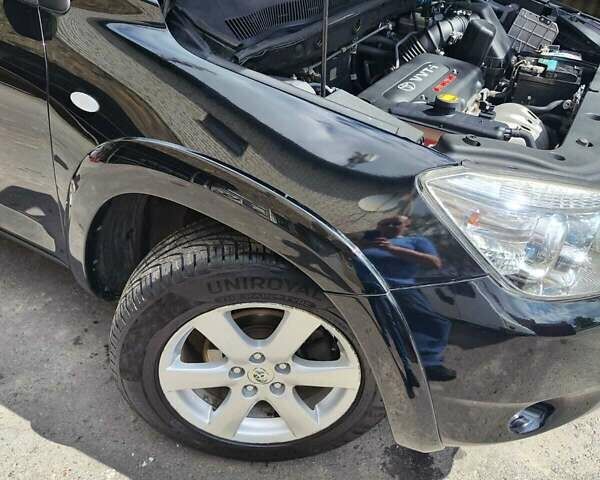 Чорний Тойота РАВ 4, об'ємом двигуна 2.4 л та пробігом 91 тис. км за 12500 $, фото 43 на Automoto.ua