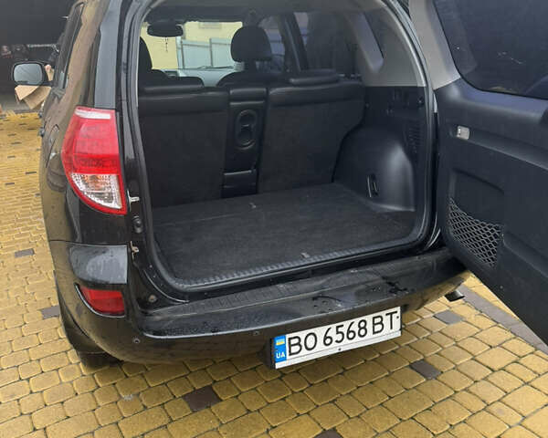 Черный Тойота РАВ 4, объемом двигателя 2 л и пробегом 230 тыс. км за 8500 $, фото 7 на Automoto.ua