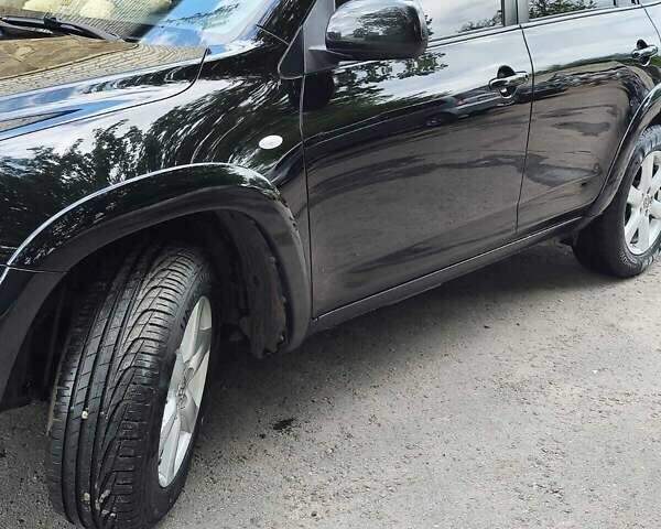 Чорний Тойота РАВ 4, об'ємом двигуна 2.4 л та пробігом 91 тис. км за 12500 $, фото 2 на Automoto.ua