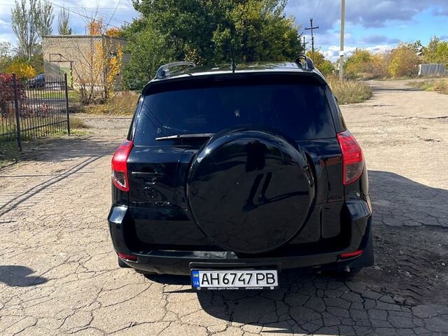 Черный Тойота РАВ 4, объемом двигателя 2.4 л и пробегом 240 тыс. км за 9600 $, фото 4 на Automoto.ua