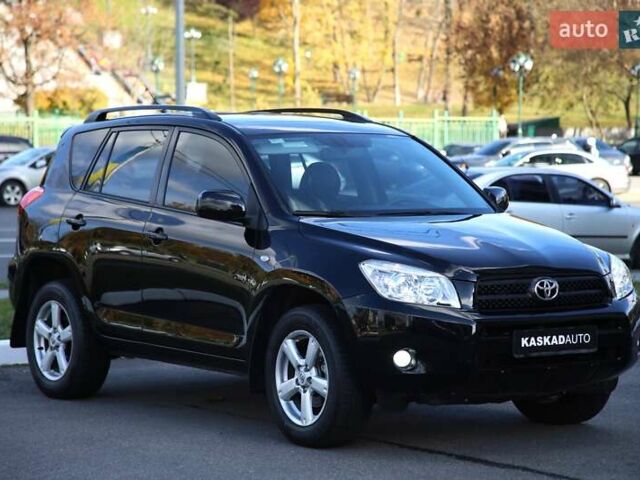 Черный Тойота РАВ 4, объемом двигателя 2 л и пробегом 170 тыс. км за 10000 $, фото 2 на Automoto.ua