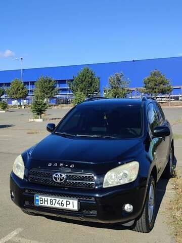 Черный Тойота РАВ 4, объемом двигателя 2 л и пробегом 165 тыс. км за 9500 $, фото 5 на Automoto.ua