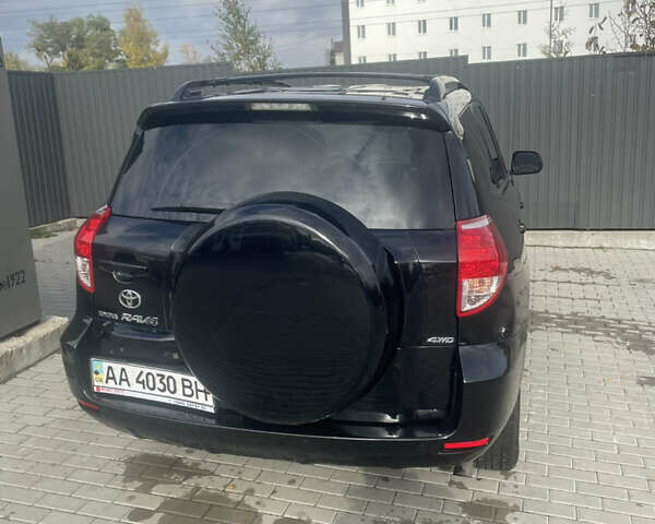 Черный Тойота РАВ 4, объемом двигателя 2.36 л и пробегом 241 тыс. км за 8900 $, фото 3 на Automoto.ua