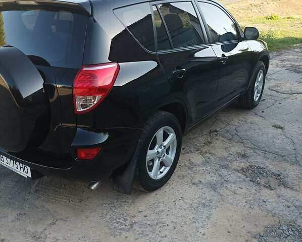 Чорний Тойота РАВ 4, об'ємом двигуна 2 л та пробігом 240 тис. км за 10300 $, фото 11 на Automoto.ua