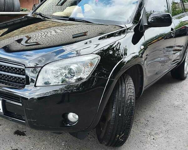 Чорний Тойота РАВ 4, об'ємом двигуна 2.4 л та пробігом 91 тис. км за 12500 $, фото 8 на Automoto.ua