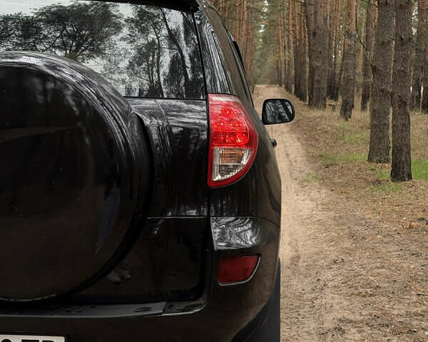 Чорний Тойота РАВ 4, об'ємом двигуна 2 л та пробігом 189 тис. км за 9500 $, фото 11 на Automoto.ua