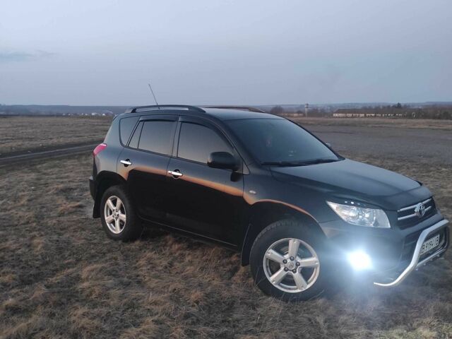 Чорний Тойота РАВ 4, об'ємом двигуна 2 л та пробігом 242 тис. км за 9000 $, фото 2 на Automoto.ua