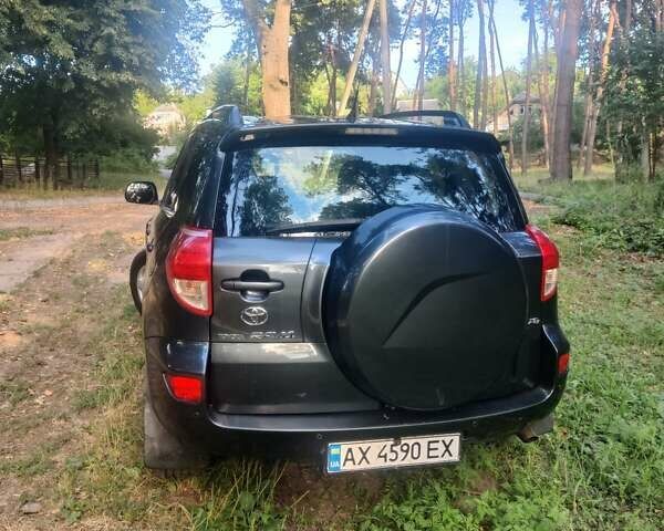 Черный Тойота РАВ 4, объемом двигателя 2 л и пробегом 294 тыс. км за 8300 $, фото 3 на Automoto.ua