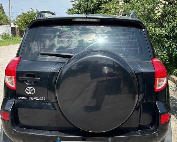 Черный Тойота РАВ 4, объемом двигателя 2 л и пробегом 291 тыс. км за 8400 $, фото 1 на Automoto.ua