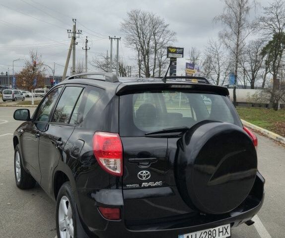 Черный Тойота РАВ 4, объемом двигателя 2 л и пробегом 173 тыс. км за 8999 $, фото 2 на Automoto.ua