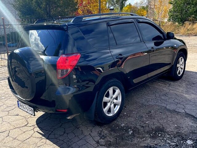 Черный Тойота РАВ 4, объемом двигателя 2.4 л и пробегом 240 тыс. км за 9600 $, фото 5 на Automoto.ua