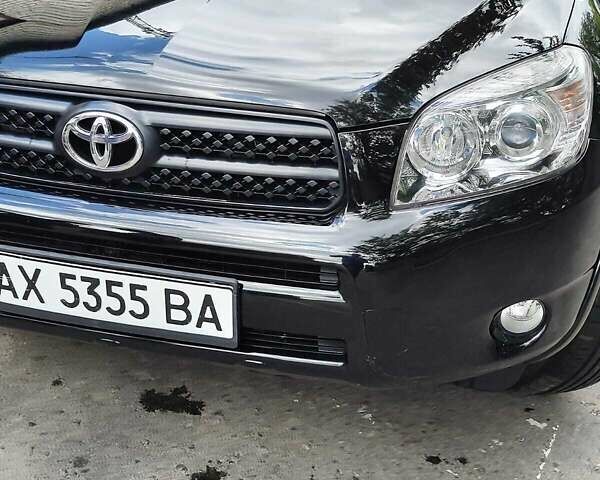 Чорний Тойота РАВ 4, об'ємом двигуна 2.4 л та пробігом 91 тис. км за 12500 $, фото 1 на Automoto.ua