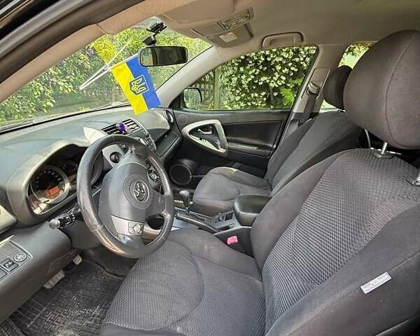 Черный Тойота РАВ 4, объемом двигателя 2 л и пробегом 291 тыс. км за 8400 $, фото 3 на Automoto.ua