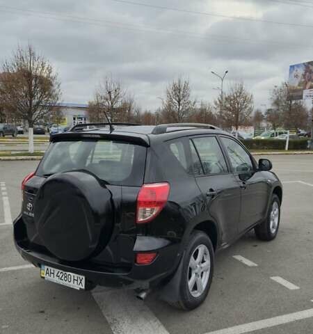 Чорний Тойота РАВ 4, об'ємом двигуна 2 л та пробігом 173 тис. км за 8600 $, фото 2 на Automoto.ua
