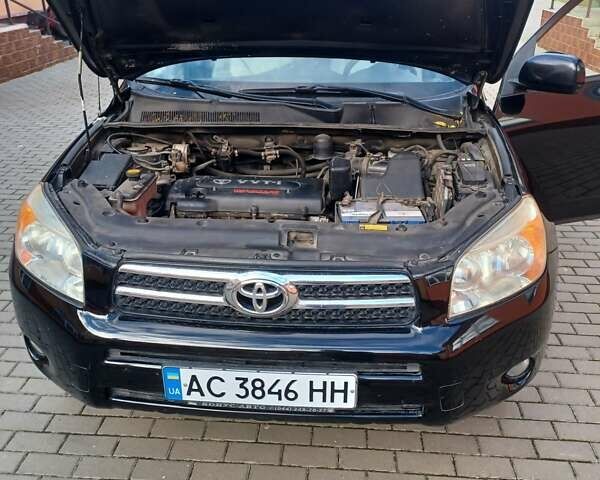 Черный Тойота РАВ 4, объемом двигателя 2.36 л и пробегом 200 тыс. км за 9000 $, фото 3 на Automoto.ua