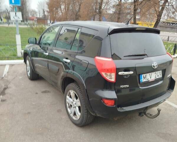 Черный Тойота РАВ 4, объемом двигателя 2.2 л и пробегом 323 тыс. км за 6000 $, фото 1 на Automoto.ua