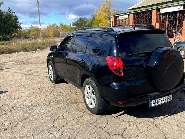 Черный Тойота РАВ 4, объемом двигателя 2.4 л и пробегом 240 тыс. км за 9600 $, фото 3 на Automoto.ua