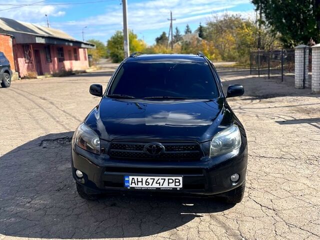 Черный Тойота РАВ 4, объемом двигателя 2.4 л и пробегом 240 тыс. км за 11000 $, фото 1 на Automoto.ua