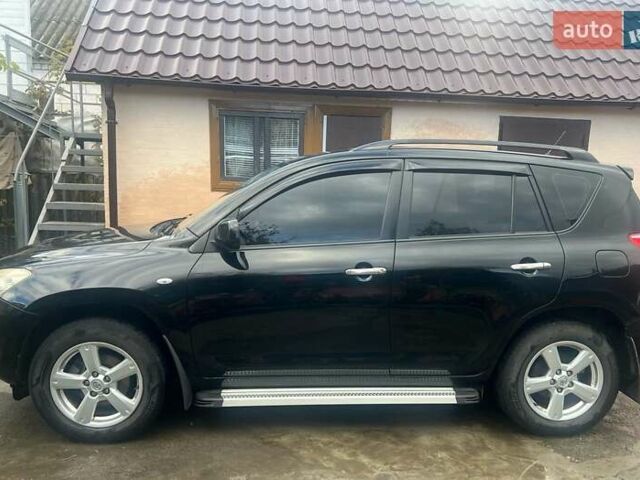 Чорний Тойота РАВ 4, об'ємом двигуна 2 л та пробігом 184 тис. км за 12000 $, фото 6 на Automoto.ua