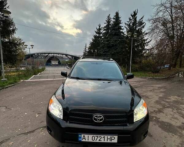 Черный Тойота РАВ 4, объемом двигателя 2.36 л и пробегом 265 тыс. км за 9499 $, фото 6 на Automoto.ua