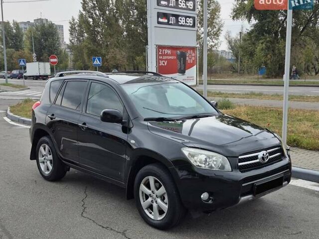 Чорний Тойота РАВ 4, об'ємом двигуна 2 л та пробігом 180 тис. км за 9700 $, фото 1 на Automoto.ua