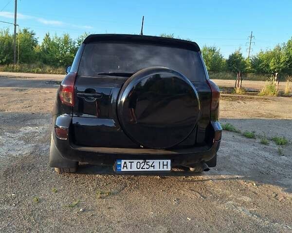 Черный Тойота РАВ 4, объемом двигателя 2 л и пробегом 264 тыс. км за 9200 $, фото 8 на Automoto.ua