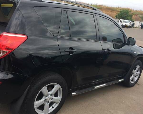 Черный Тойота РАВ 4, объемом двигателя 2 л и пробегом 229 тыс. км за 9900 $, фото 7 на Automoto.ua