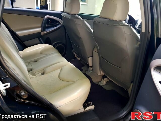 Чорний Тойота РАВ 4, об'ємом двигуна 2.4 л та пробігом 228 тис. км за 9500 $, фото 4 на Automoto.ua