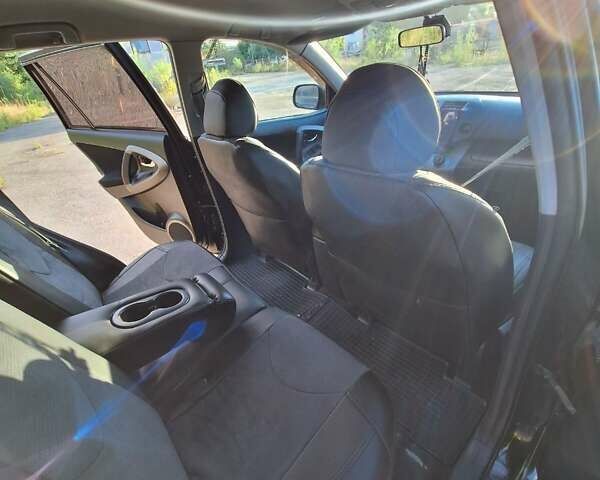 Черный Тойота РАВ 4, объемом двигателя 2 л и пробегом 264 тыс. км за 9200 $, фото 32 на Automoto.ua