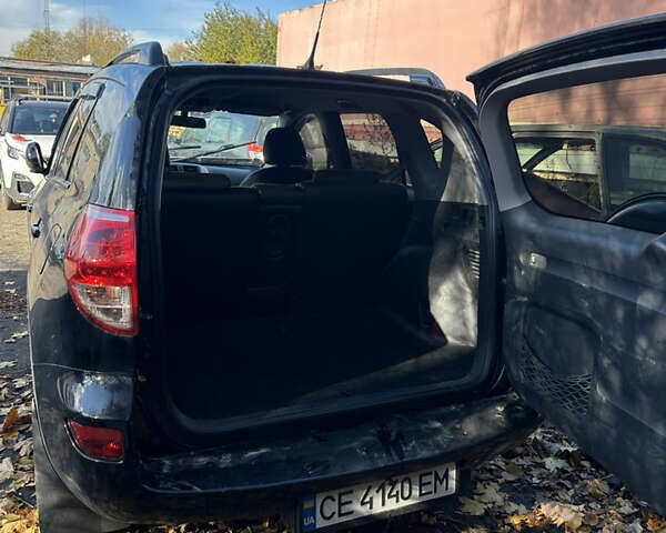 Черный Тойота РАВ 4, объемом двигателя 2 л и пробегом 200 тыс. км за 6500 $, фото 6 на Automoto.ua