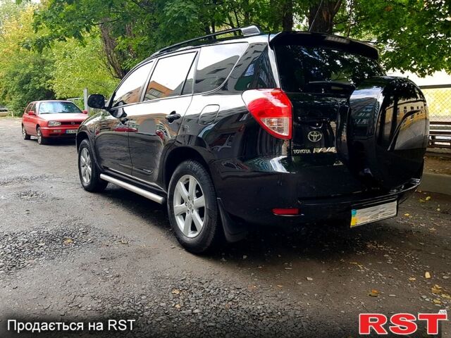 Чорний Тойота РАВ 4, об'ємом двигуна 2.4 л та пробігом 228 тис. км за 9500 $, фото 1 на Automoto.ua